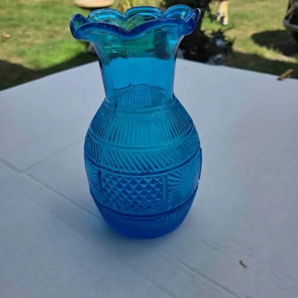 Vintage Clevenger Bros vase in light blue